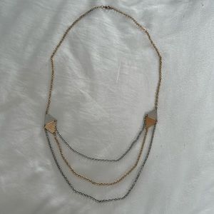 Gold and silver colored necklace